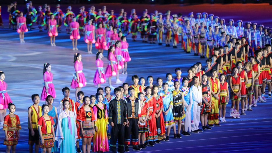 海南省第七屆少數(shù)民族傳統(tǒng)體育運動會開幕式現(xiàn)場充滿“民族風”